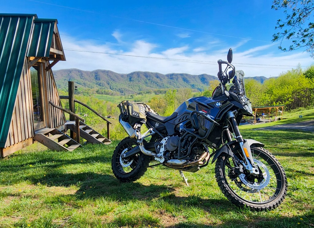 Overlanding motorcycle parked at Breath of Dawn VA Cabin Breazy Southwest Virginia Farmstay. 